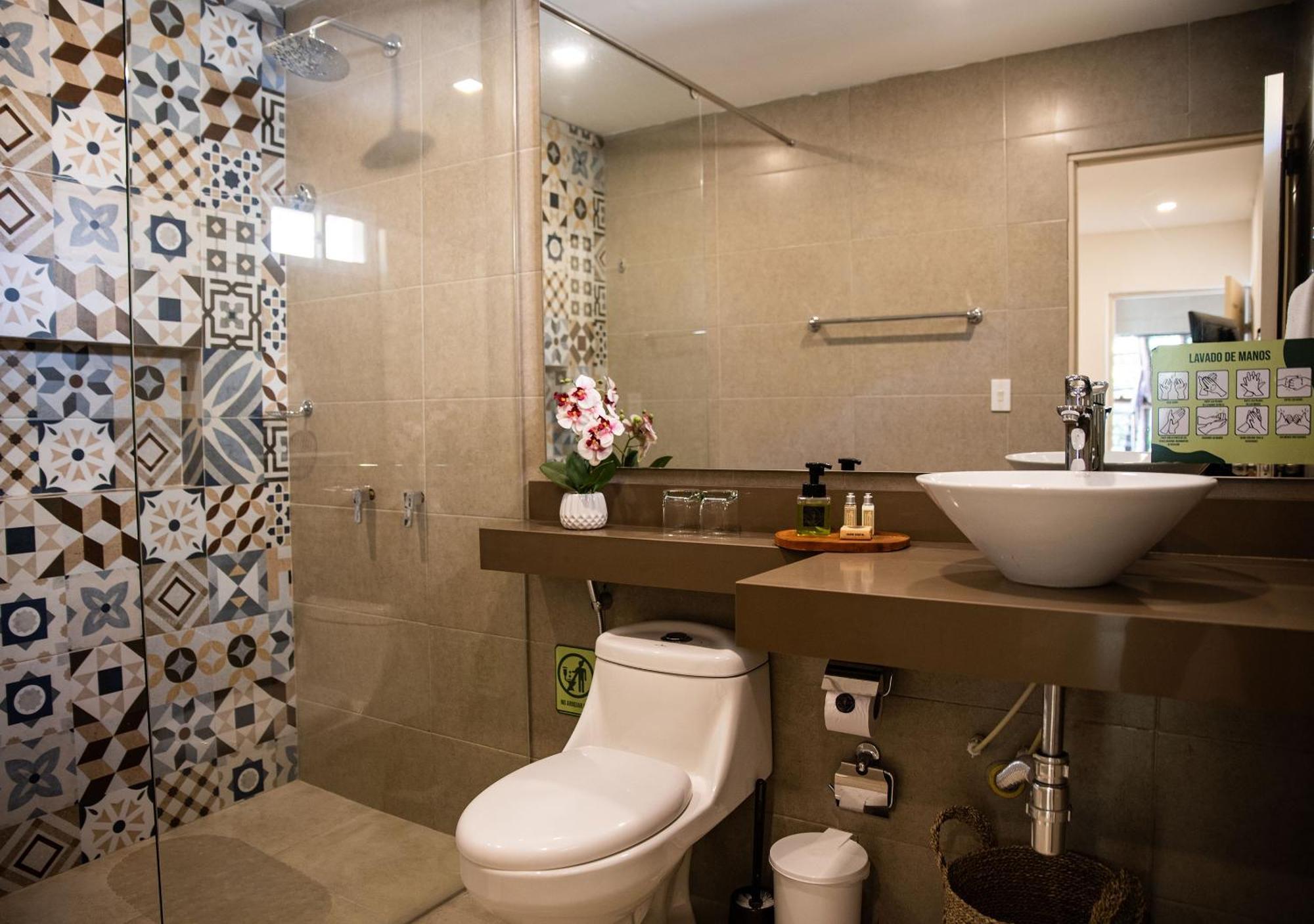 Gardenia Springs Hotel Буритака Стая снимка